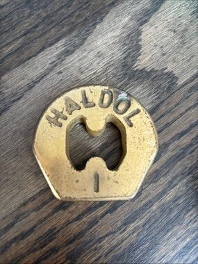 Vintage Haldol paperweight, brass, pharma marketing, 2.5”, .5” tall
